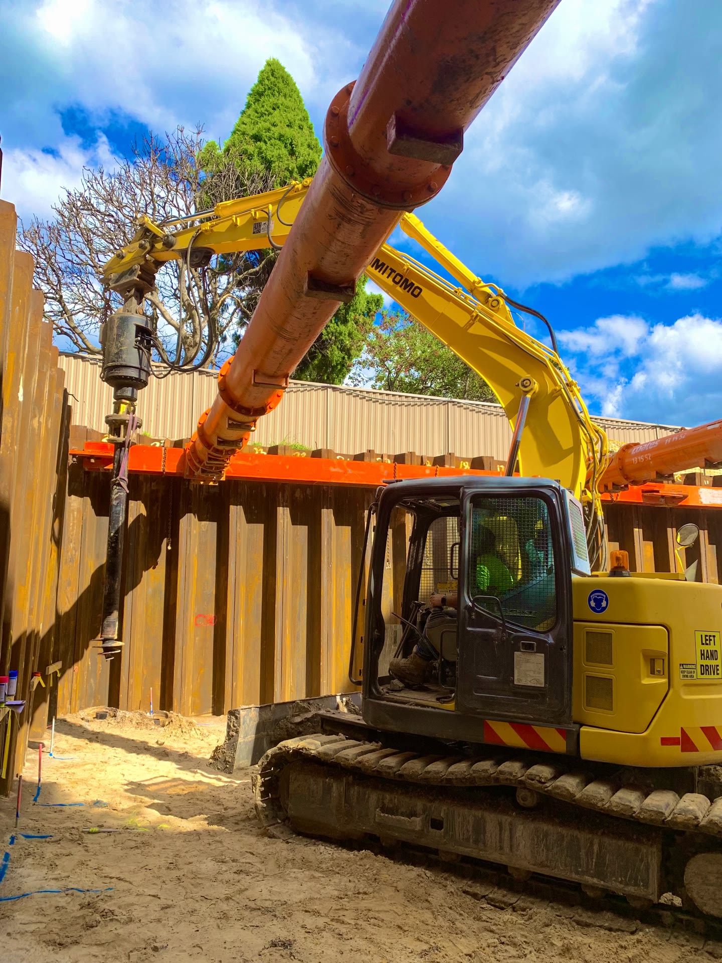 Hydraulic drive head installing a Multiturn screw pile on site